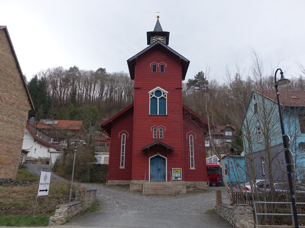 Rbeland, evangelische Christuskirche, kleine rot gestrichene Saalkirche, erbaut 1868 (22.03.2024)