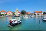 Hafen-Ensemble in Lindau (Bodensee), mit Hotels, dem Mangturm und dem Bundespolizeirevier (rechter Bildrand).