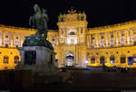 Neue Burg der Hofburg Wien (AT) am Abend.