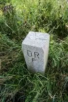 Grenzstein an der deutsch-d�nischen Grenze bei Ellund-Ost. �DRP� steht f�r Deutsches Reich Preu�en. Aufnahme: 28. Juli 2023.