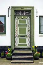 Eingangst�r an der Storegade in Augustenburg auf der Insel Alsen (Nordschleswig). Aufnahme: 20. M�rz 2024.