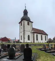 Geisa - Spahl: Kirche St. Cyriakus im M�rz 2023. Der Turm stammt aus dem Jahr 1504 und wurde 1514 vollendet, das Kirchenschiff wurde zwischen 1720 und 1724 erbaut.