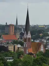 Blick vom Wasserturm Flensburg-M�rwik auf die Kirchen Sankt J�rgen und Sankt Nikolai, sowie dem Rathaus dahinter. (Juni 2024)