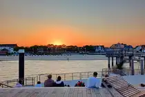 Sonnenuntergang in Wyk auf F�hr, beobachtet von der  Neue Mittelbr�cke  - 09.09.2024