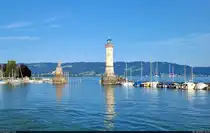 L�we und Leuchtturm s�umen die Hafeneinfahrt von Lindau. Die Berge im Hintergrund geh�ren bereits zu �sterreich.

🕓 30.7.2024 | 18:56 Uhr