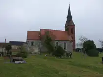 Zieko, evangelische St. Johannes Kirche, sp�tromanische Saalkirche aus Feldstein, erbaut ab 1183, Westturm erbaut 1894 (11.12.2024)