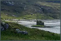 Auf einer winzigen Insel im Loch Tangasdale steht der Mac Leod's Tower, ein kleiner mittelalterlicher Wehrturm. (Barra, 09.05.2025)