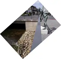  Der Spezialist  begutachtet den Rohrbruch an der Wittekindstra�e in Osnabr�ck. Er wurde vom Bildhauer Hans Gerd Ruwe (1926 - 1995) geschaffen. 10.09.2011