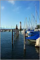 Blick vom Hafen auf den Bayrischen L�wen und den neuen Leuchturm,Jahrgang 1856,  von Lindau.
(21.09.2011)