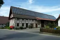 D�rnau, gro�e Bauernh�fe im Fachwerkstil pr�gen das Dorfbild, Aug.2012