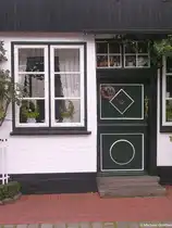 Detailansicht eines der sch�nen H�user der Fischesiedlung Holm in Schleswig (Schleswig-Holstein, Herbst 2009)