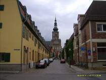 Blick durch die Hunnenstra�e auf den Turm von Dom St.Nicolai.