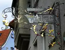 F�ssen, Schild an einem Friseursalon, April 2014