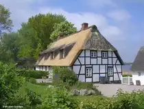 Reetdach gedecktes Haus bei Sieseby an der Schlei (Kreis Rendsburg-Eckernf�rde, Schleswig-Holstein, Mai 2010)