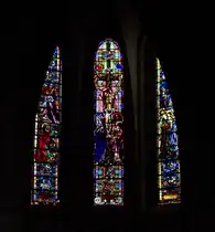 Kurz hinter der Grenze in Lothringen liegt Bouzonville. Hier gab es eine Klosteranlage, einige Geb�ude erinnern noch daran. Die sonst eher schlichte Kirche Sainte Croix besitzt aber sehenswerte Kirchenfenster. 03.04.2015.