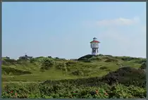 Die D�nenlandschaft mit dem Wahrzeichen der Insel Langeoog - dem 1909 errichteten Wasserturm. (21.08.2015)