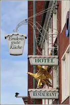 Emden. Wirtshausschild des Hotel - Restaurant  Goldener Adler , direkt neben dem Rathaus gelegen.
10.03.2017