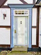 Eingangst�r an der Gasse �Uldgade� in T�nder (deutsch: Tondern - friesisch: Tuner) in S�nderjylland/Nordschleswig. Aufnahme: 22. Februar 2021.