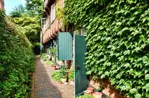 Fachwerkshaus im westlichen Teil des L�becker Glandorps Hofes. Die G�nge und H�fe in der L�becker Altstadt sind fast immer durch einen Durchgang im Stra�enhaus zu erreichen. Aufnahme: 21. August 2021.