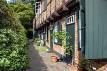 Fachwerkshaus im westlichen Teil des L�becker Glandorps Hofes. Die G�nge und H�fe  in der L�becker Altstadt sind fast immer durch einen Durchgang im Stra�enhaus zu erreichen. Aufnahme: 21. August 2021.