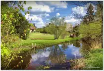 Grundst�cke an der Fintau in Lauenbr�ck Kreis Rotenburg (W�mme). Nach wenigen hundert Metern m�ndet die Fintau in der W�mme. Fr�hling, April 2022.